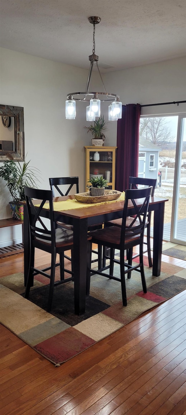 1728 Rivers Edge, Minot, ND 58701 - dining space featuring wood-type flooring