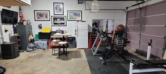 1728 Rivers Edge, Minot, ND 58701 - garage featuring freestanding refrigerator