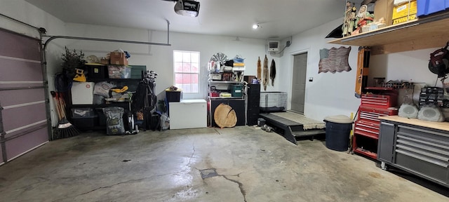 1728 Rivers Edge, Minot, ND 58701 - garage with a workshop area and a garage door opener