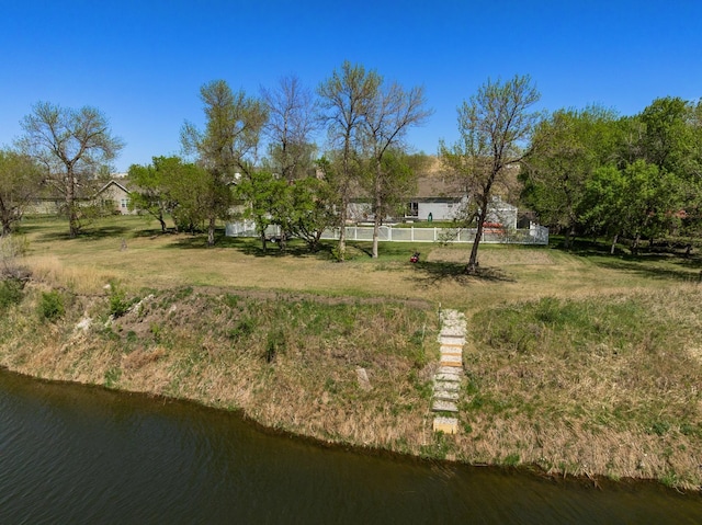 1728 Rivers Edge, Minot, ND 58701 - view of yard with a water view
