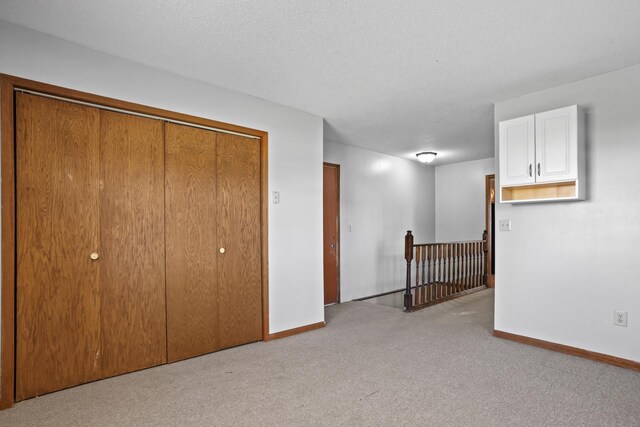 3574 91st St, Mohall, ND 58761 - below grade area with carpet and baseboards