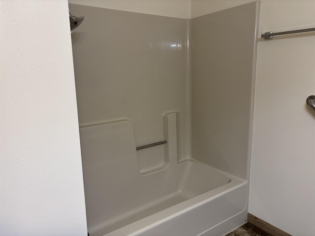 2420 8th St Unit 2420, Minot, ND 58703 - full bathroom featuring a shower and a bath
