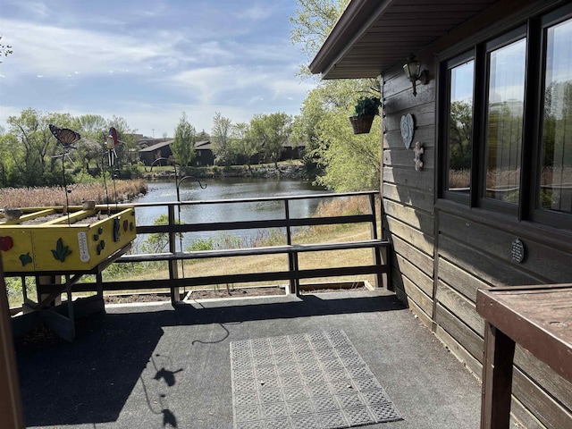 2420 8th St Unit 2420, Minot, ND 58703 - balcony with a water view