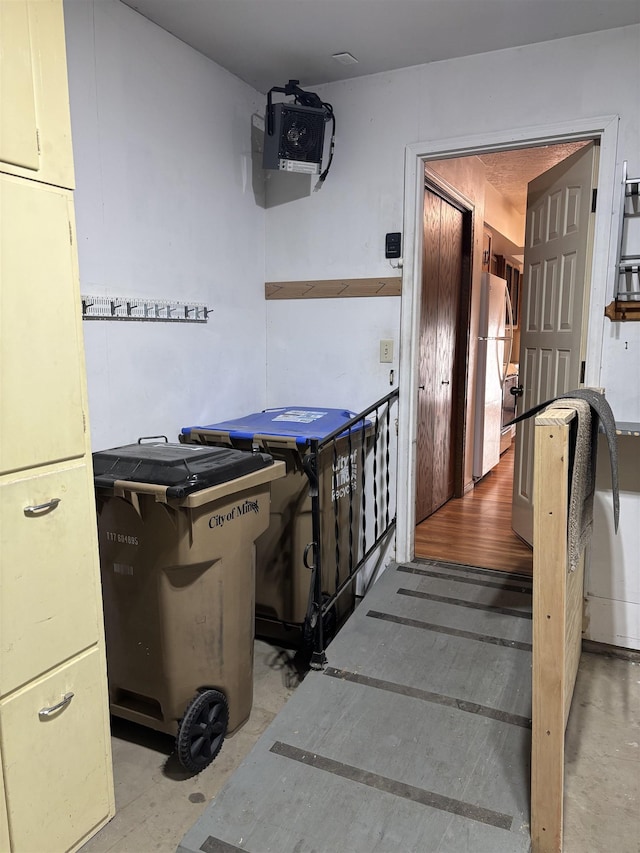 2420 8th St Unit 2420, Minot, ND 58703 - stairway featuring concrete floors
