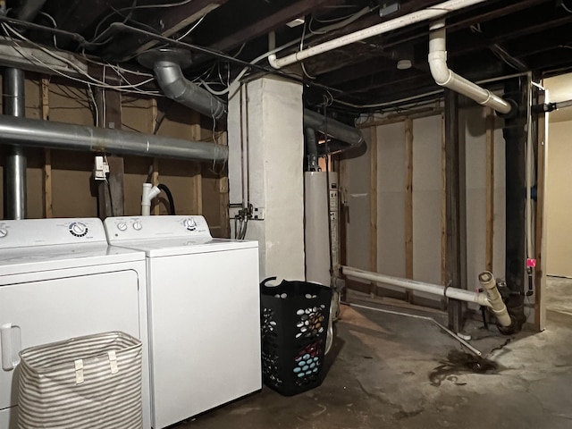 410 6th Ave, Minot, ND 58703 - unfinished basement featuring washer and dryer and water heater