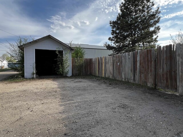 410 6th Ave, Minot, ND 58703 - garage featuring fence