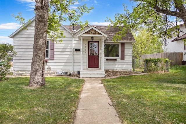 1309 1st St, Minot, ND 58701 - view of front of home with roof with shingles