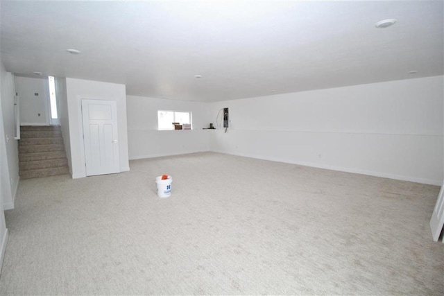 138 Mulberry Loop, Minot, ND 58703 - bonus room featuring carpet flooring, stairs, and baseboards