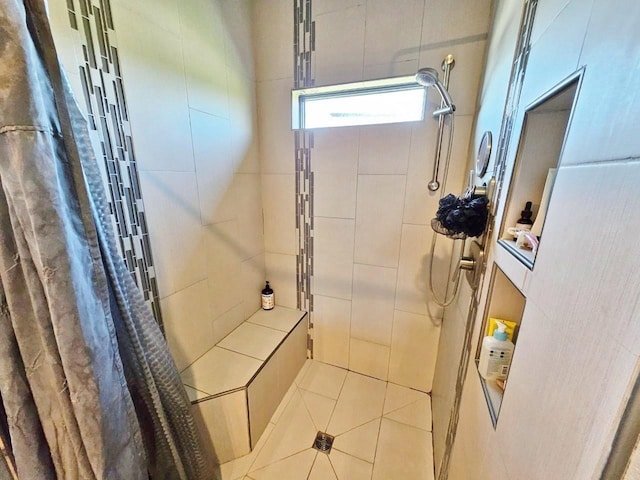 1007 5th St, Rugby, ND 58368 - full bath with a tile shower and tile patterned flooring