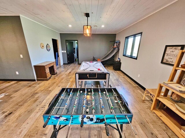 1007 5th St, Rugby, ND 58368 - playroom with wood ceiling, wood-type flooring, recessed lighting, ornamental molding, and baseboards