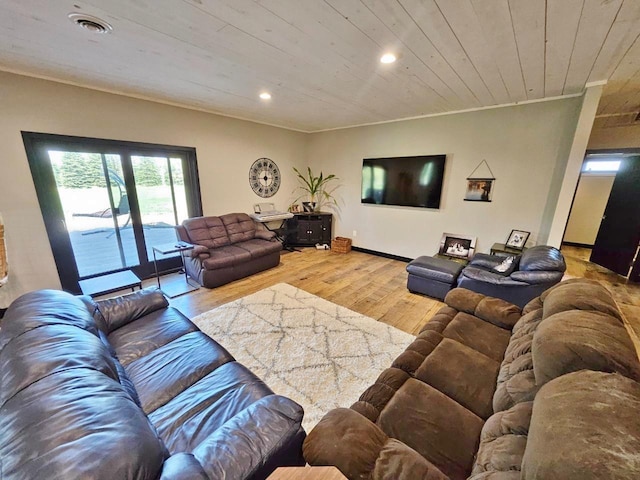 1007 5th St, Rugby, ND 58368 - living room with wood finished floors, ornamental molding, recessed lighting, wooden ceiling, and baseboards