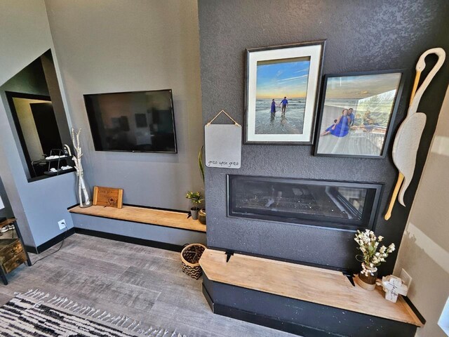 1007 5th St, Rugby, ND 58368 - living room featuring wood finished floors and baseboards