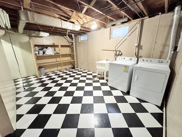 1201 Soo St, Minot, ND 58701 - laundry area with independent washer and dryer and tile patterned floors
