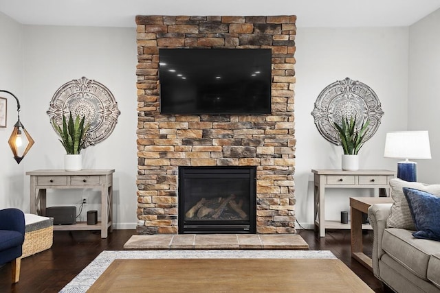 1804 Valley Bluffs Dr, Minot, ND 58701 - living area featuring wood finished floors and a glass covered fireplace