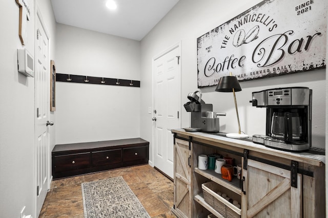 1804 Valley Bluffs Dr, Minot, ND 58701 - mudroom with stone finish floors and baseboards