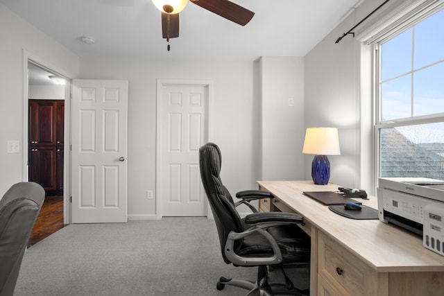 1804 Valley Bluffs Dr, Minot, ND 58701 - carpeted office space featuring ceiling fan and baseboards