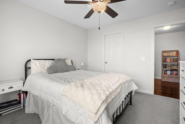 1804 Valley Bluffs Dr, Minot, ND 58701 - carpeted bedroom featuring baseboards and ceiling fan