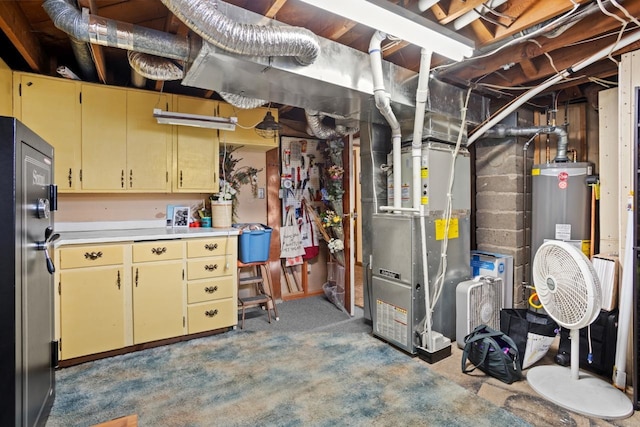 917 17th St Unit 0, Minot, ND 58703 - unfinished below grade area featuring refrigerator, heating unit, gas water heater, and carpet flooring