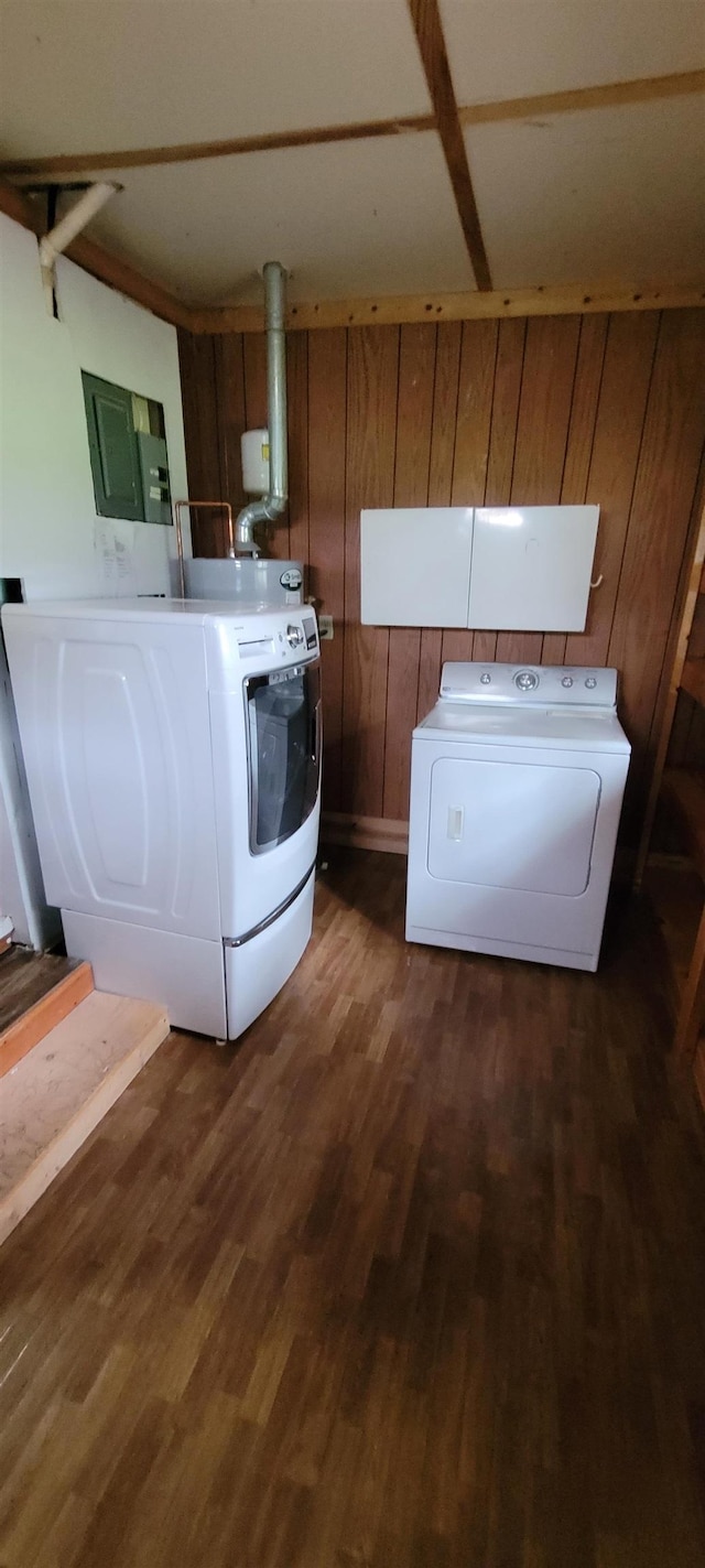 101 Central Ave, Des Lacs, ND 58733 - clothes washing area featuring dark wood-style floors, electric panel, and washer and clothes dryer