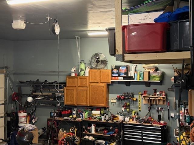 1805 28th St, Minot, ND 58703 - garage featuring a workshop area