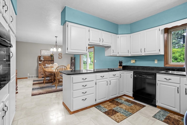 3900 16th St, Minot, ND 58703 - kitchen featuring black appliances, dark countertops, healthy amount of natural light, and white cabinetry