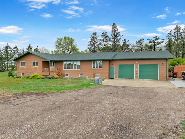 3900 16th St, Minot, ND 58703 - ranch-style home featuring dirt driveway, a garage, and a front yard