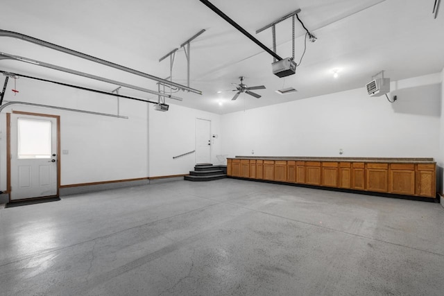 625 34th Ave Unit A, Minot, ND 58701 - garage with a garage door opener and baseboards
