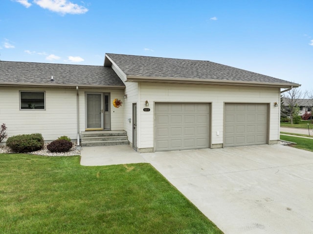 625 34th Ave Unit A, Minot, ND 58701 - ranch-style home with driveway, a garage, a front lawn, and a shingled roof