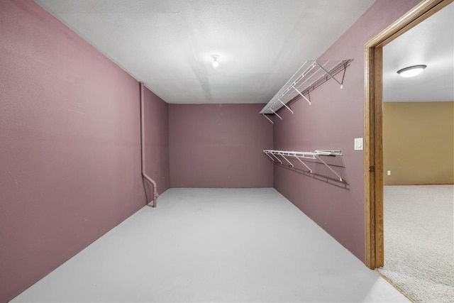 625 34th Ave Unit A, Minot, ND 58701 - spacious closet featuring carpet flooring