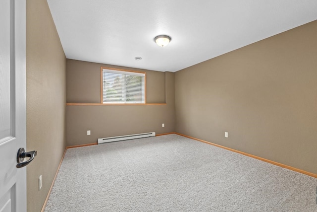 625 34th Ave Unit A, Minot, ND 58701 - carpeted spare room featuring baseboard heating and baseboards