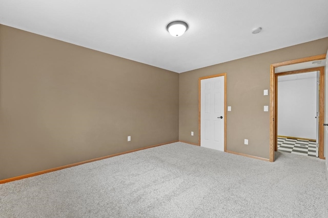 625 34th Ave Unit A, Minot, ND 58701 - unfurnished room with carpet and baseboards