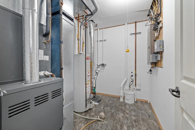 625 34th Ave Unit A, Minot, ND 58701 - utility room with gas water heater and heating unit
