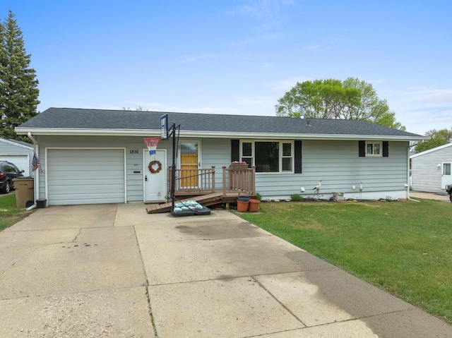 1816 7th St, Minot, ND 58703 - ranch-style house featuring driveway, a garage, a front yard, and a shingled roof