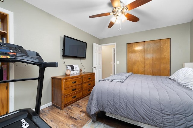 1816 7th St, Minot, ND 58703 - bedroom with light wood-type flooring, baseboards, and ceiling fan