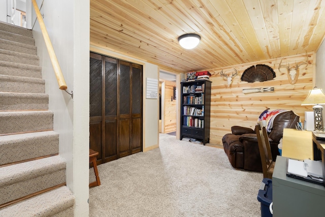 1816 7th St, Minot, ND 58703 - living area featuring stairs, carpet, and wooden ceiling