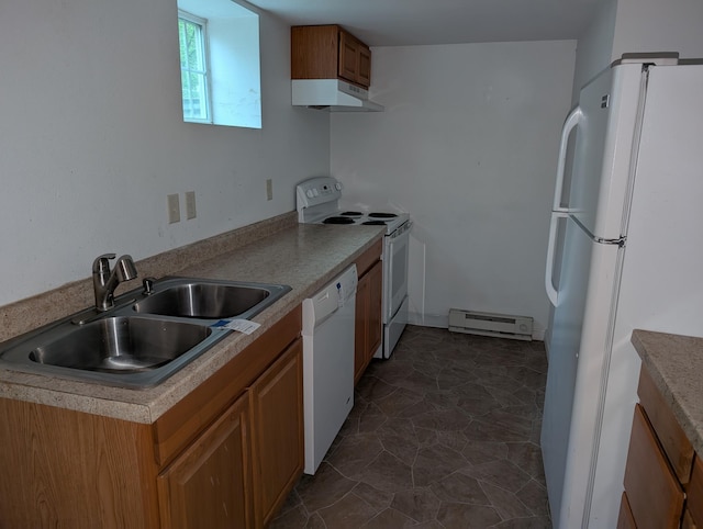 807 NW 8th St, Minot, ND 58703 - kitchen with white appliances, a baseboard radiator, under cabinet range hood, a sink, and brown cabinets