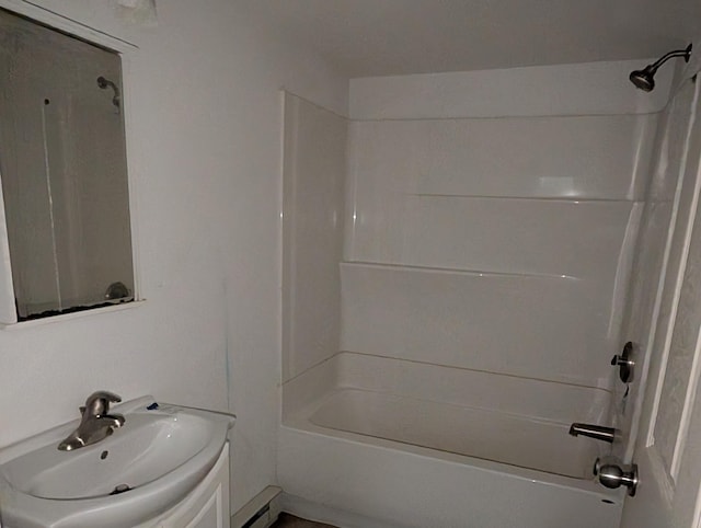 807 NW 8th St, Minot, ND 58703 - full bathroom with shower / tub combination and vanity