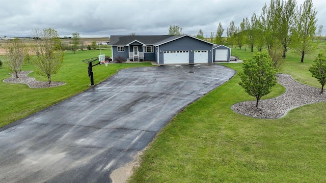 3030 Mustang Trl, Minot, ND 58703 - ranch-style home featuring driveway, an attached garage, and a front yard
