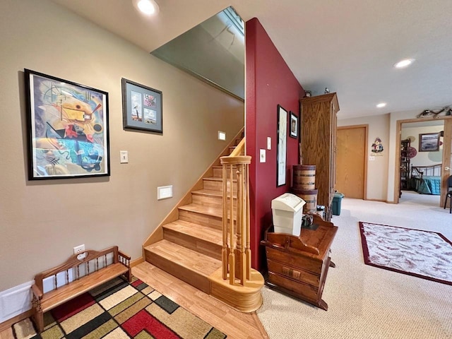 2900 8th St, Minot, ND 58701 - stairs featuring recessed lighting, carpet, and baseboards