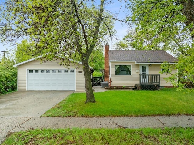 1111 15th St, Minot, ND 58703 - view of front of property with a chimney, a garage, a front lawn, and an outdoor structure