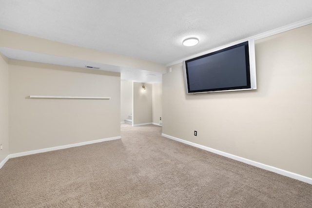 1111 15th St, Minot, ND 58703 - finished basement with carpet flooring and baseboards