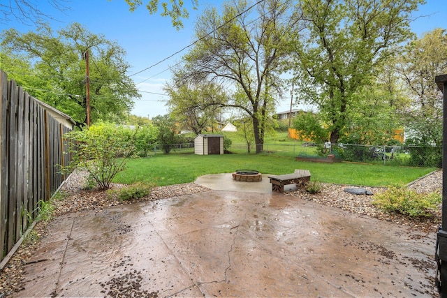 1111 15th St, Minot, ND 58703 - view of patio / terrace featuring an outdoor fire pit