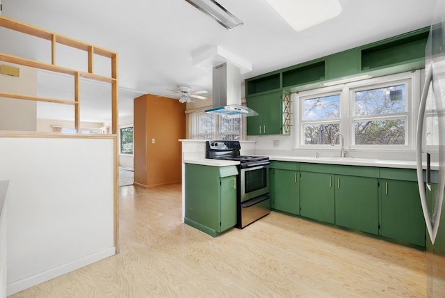 1200 9th St, Minot, ND 58703 - kitchen featuring green cabinets, stainless steel electric range oven, island range hood, a sink, and light countertops
