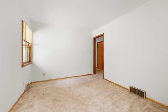 1200 9th St, Minot, ND 58703 - unfurnished room with carpet and baseboards
