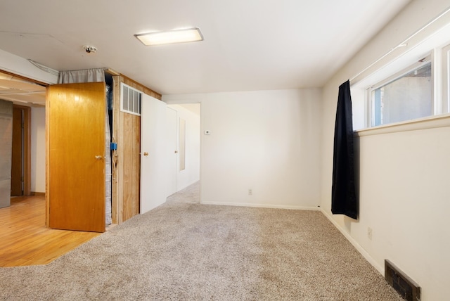 1200 9th St, Minot, ND 58703 - unfurnished bedroom with carpet floors and baseboards