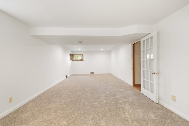 1200 9th St, Minot, ND 58703 - basement featuring carpet, baseboards, and recessed lighting