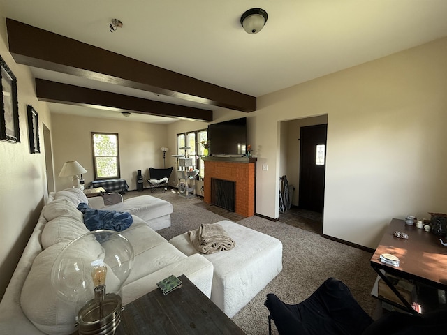 119 NW 6th St, Minot, ND 58703 - carpeted living room featuring beamed ceiling, baseboards, and a brick fireplace