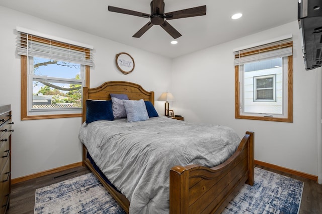 1213 Sunset Blvd, Minot, ND 58703 - bedroom with baseboards, wood finished floors, recessed lighting, and ceiling fan
