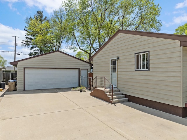 1213 Sunset Blvd, Minot, ND 58703 - view of front facade with a detached garage and an outbuilding
