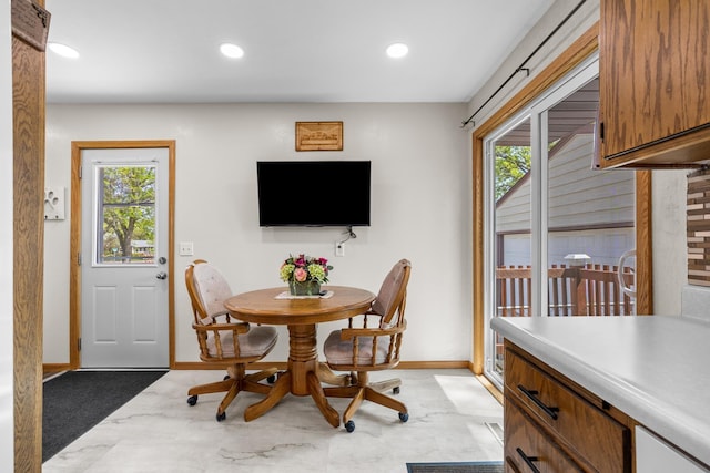 1213 Sunset Blvd, Minot, ND 58703 - dining room featuring baseboards and recessed lighting